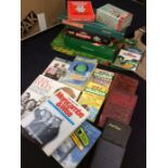 A collection of classic board games: scrabble, backgammon, totopoly, coronation st trivia, ect.