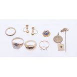 A collection of gold jewellery to include a 9ct gold stick pin with rat motif, 9ct gold Medallion-