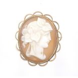 A Victorian shell cameo brooch, carved depicting a profile with leaves in hair, approx 3cm x 2.