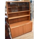 1970s teak display cabinet with two shelves behind smoked glass above single shelf above two