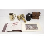 Brass items including; a tankard, desk cannon, a book along with a camera and case