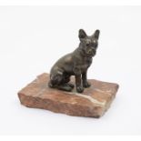 A bronze French bulldog, on a marble base