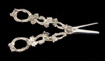 A 19th Century style silver grape scissors, the handle cast as trailing foliage, hallmarked, 3.69