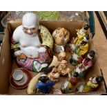 A collection of Chinese deities including Buddha, miniature tea set with other china wares, along