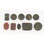 A collection of ten Grand Tour intaglios seals comprising  Roman and 18th Century examples,