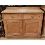 Antique pine kitchen unit with two single drawers above two cupboard doors with splash back knob