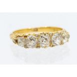 A Victorian diamond and 18ct gold five stone ring comprising five old cushion cut diamonds, with