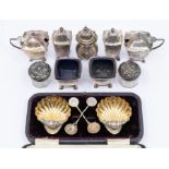 A collection of silver condiments to include: a Modern six piece set (2 salts, 2 mustard & 2
