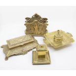 An Art Nouveau style letter rack, a stamp holder and two inkwells