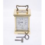 A good Woodford brass carriage clock with Fema 11 jewel movement. Two-train movement striking on a