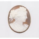 A 19th century shell cameo brooch, carved with a profile of a bacchante, approx 4cm x 3.5cm, in an