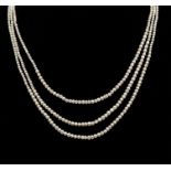 A 19th Century three strand seed pearl necklace, comprising graduated three rows of graduated pearls