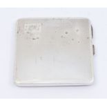 A George VI silver engine turned cigarette case, engraved with initials, hallmarked by W Neale,