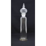 A large glass Pharmacy jar and cover, height approx. 56cm. Slight chips to base, otherwise generally