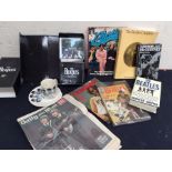 A collection of Beatles memorabilia including; large back catalogue of the 1960's, official