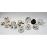 A collection of mid 20th Century tea and coffee sets including later dinner wares