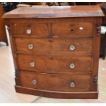 Victorian bow front chest of two above three drawers, mahogany and walnut veneer, glass knob