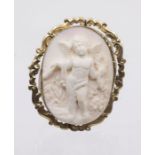 A 19th century conch shell cameo brooch, carved depicting a putto holding laurel wreaths, approx 5cm