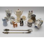 A collection of 19th and early 20th Century ceramics, figures in stone ware, jugs, jelly moulds,