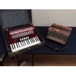 A cased Hohner Concerto IIIN piano accordion, along with Russian made Accordion, no case, both in