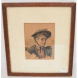 Early 20th Century, watercolour of a young woman wearing a bonnet, unsigned, 15 x 11cm, framed and