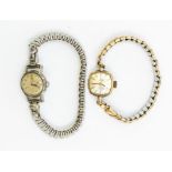 Two vintage wristwatches including a ladies Omega, round dial (some marks to dial) steel case and