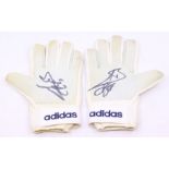 Football: A pair of Adidas goalkeeping gloves, signed by Fabien Barthez to the palm of each glove in