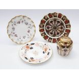 A group of Royal Crown Derby to include:  1. Old Imari 1128 ginger jar and cover, red factory