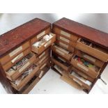 Angling Interest; a fly tying chest C1910 with 32 drawers and feathers