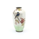 A Japanese Meji period ginbari enamel baluster vase, decorated with bird perched on prunus branch,