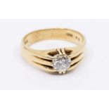 A diamond and 18ct gold solitaire ring comprising a round brilliant cut diamond approx 0.80ct,