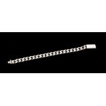 Gucci- a ladies silver curb link bracelet, with fancy box clasp marked 'Gucci' length approx 18.5cm,