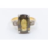 A stone set 18ct gold ring, comprising a claw set cushion cut stone possibly olivine,  approx 9 x