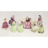 A collection of Kazthutte figures, including bookends; figure on couch; crinoline ladies (6)