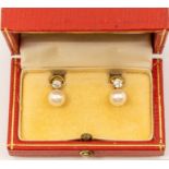 A pair of cultured pearl and diamond 18ct gold earrings, comprising round cultured pearls approx