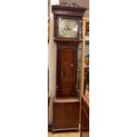 A W&H mantel clock in oak case with 6" silvered square dial. A 2 train movement chiming on a gong.