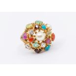 A multi stone set gold tuti fruitti ring, set with various types and cuts of stones, including