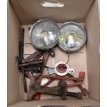 Two mid 20th Century vintage Lucas fog lights, along with vintage car jack and other vintage car