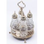 A George III silver circular cruet holder, the border with pierced geometric quatrefoil gallery,