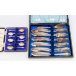 A cased set of six silver coffee spoons, hallmarked Birmingham, 1921, 1.49 ozt together with a set