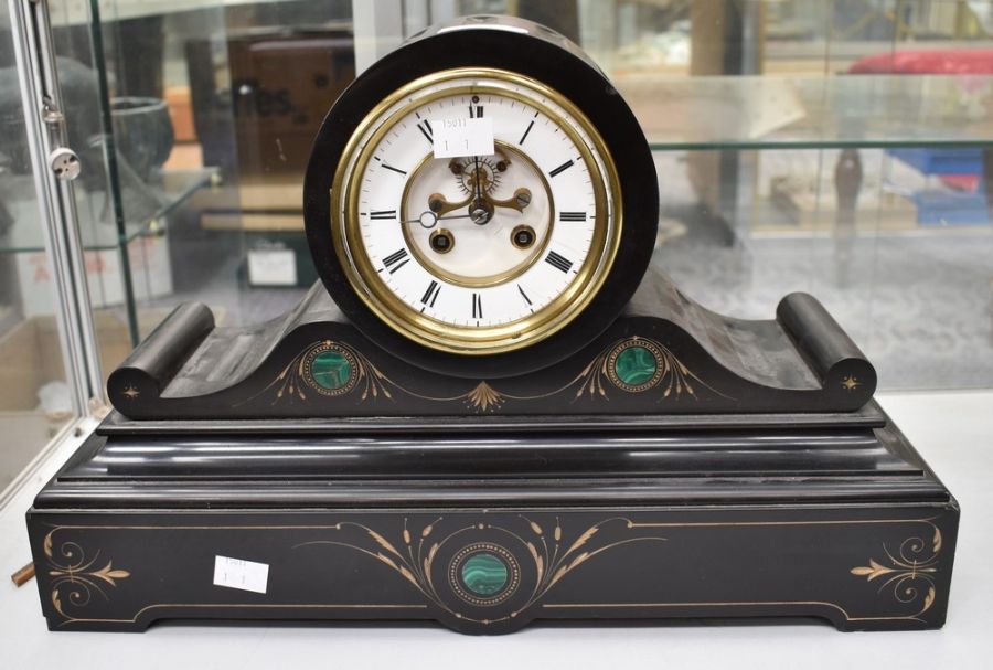 A Victorian slate mantel clock, a two-train skeletonised, jewelled escapement. French movement.