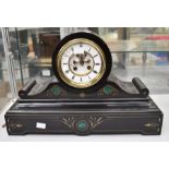 A Victorian slate mantel clock, a two-train skeletonised, jewelled escapement. French movement.