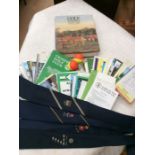 A collection of vintage golfing ties, winter golf balls, course handbooks, country wide golf club