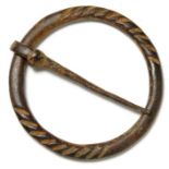 Medieval bronze annular buckle with pin, the front face decorated with two areas of incised