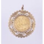 A Edward VII sovereign dated 1909 mounted in a fancy pendant mount, total gross weight approx 12.