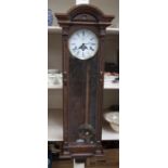 Early to mid 20th Century mahogany Vienna clock with two weights, chiming