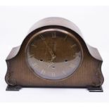 Smiths three-train Mantel Clock contained in an oak case with 7" dial. Case is 13" x 9" x 4".