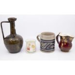 A group of early 20th Century ceramics to include: 1. Crown Devon pattern no: 5293, burgundy body