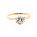 A diamond and 18ct gold solitaire ring, comprising a claw set round brilliant cut diamond weighing