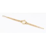 A ladies Omega 18ct gold wristwatch, round champagne dial with applied baton markers, case approx